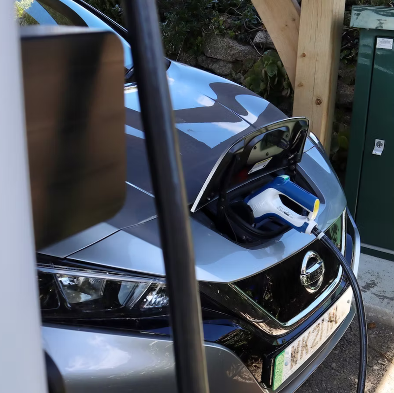 Electric car being charged