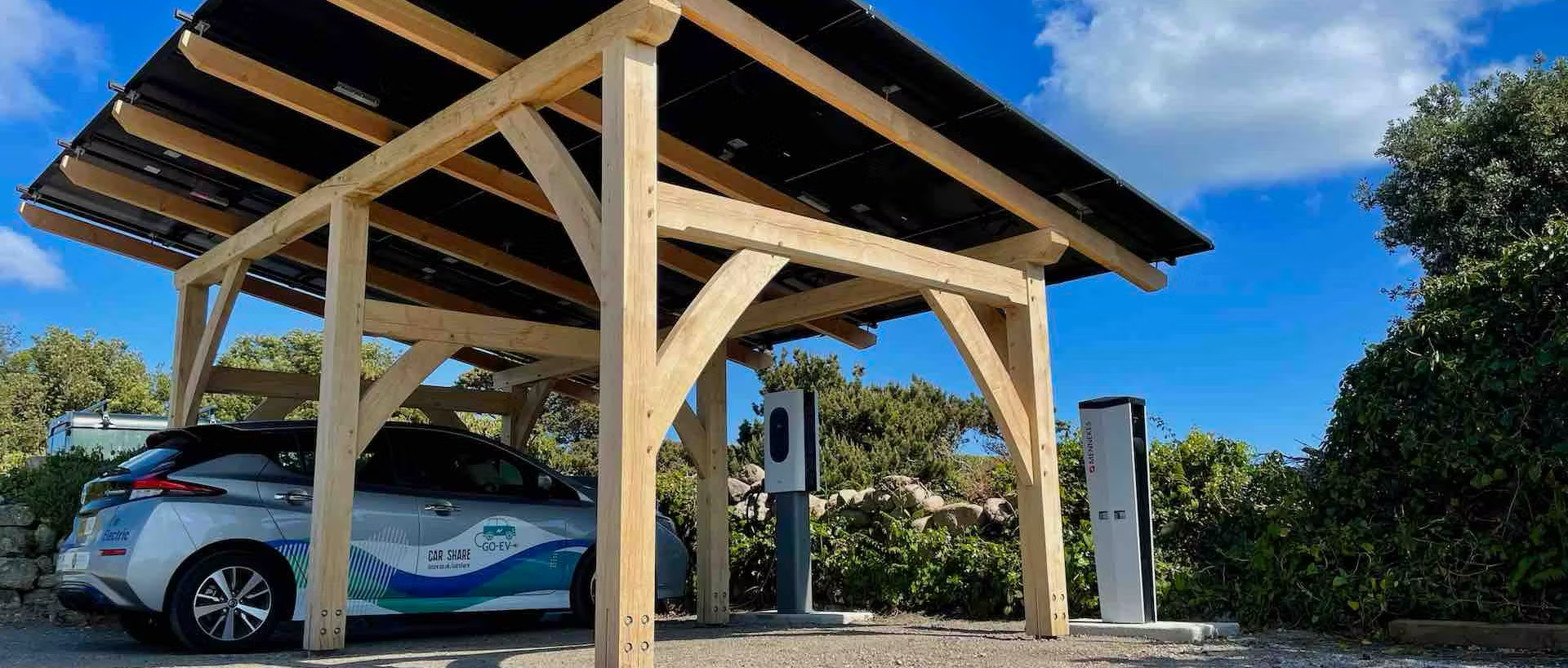 GO EV car under solar canopy